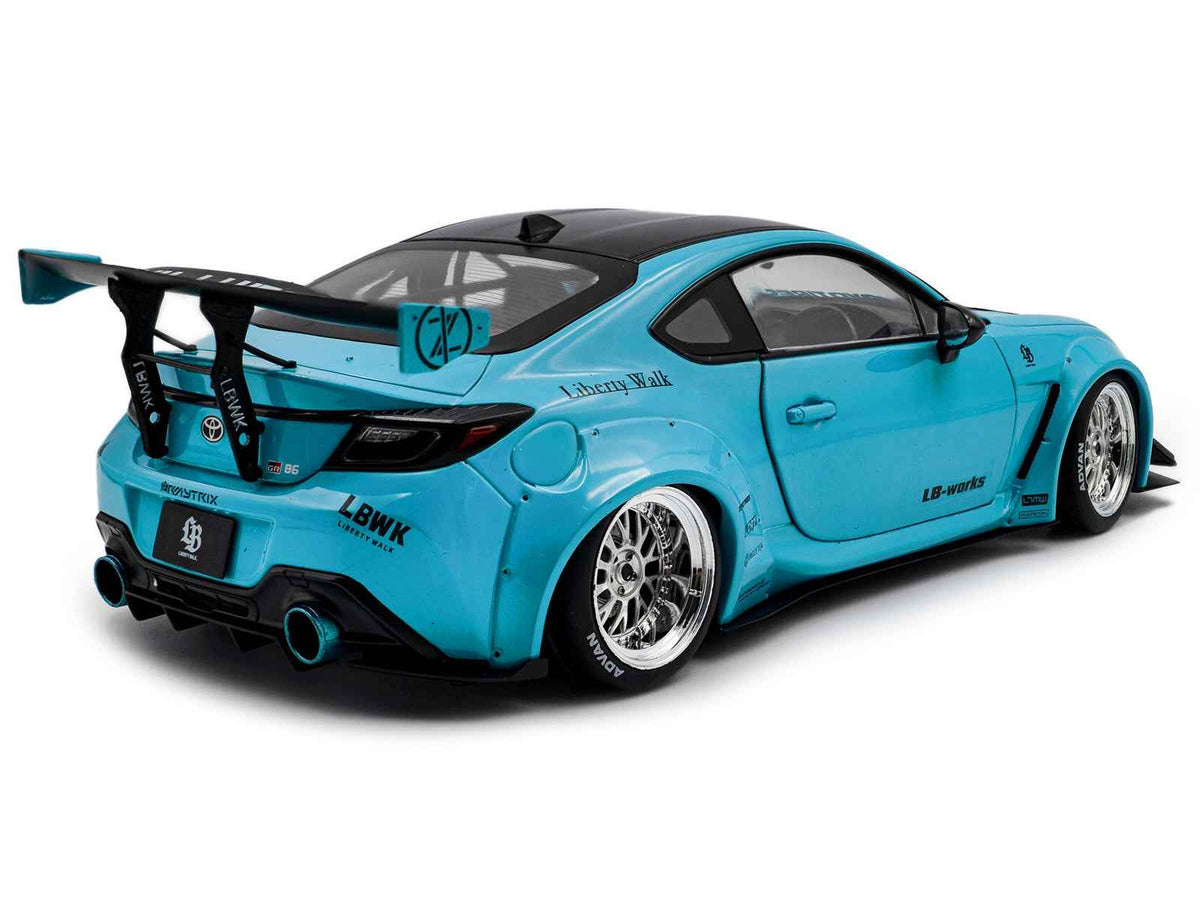 2024 Toyota GR86 LBWK diecast model car in baby blue with black top, right-hand drive, 1/18 scale by Solido.