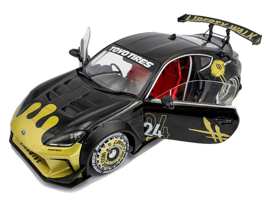 2024 Toyota GR86 Liberty Walk Body Kit RHD (Right Hand Drive) #24 Black with Gold Graphics 1/18 Diecast Model Car by Solido