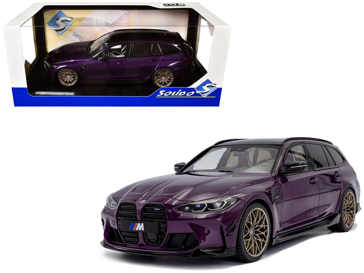 Miniature 2024 BMW M3 Competition M xDrive Touring model car in Twilight Purple Pearl Metallic with black top, by Solido.