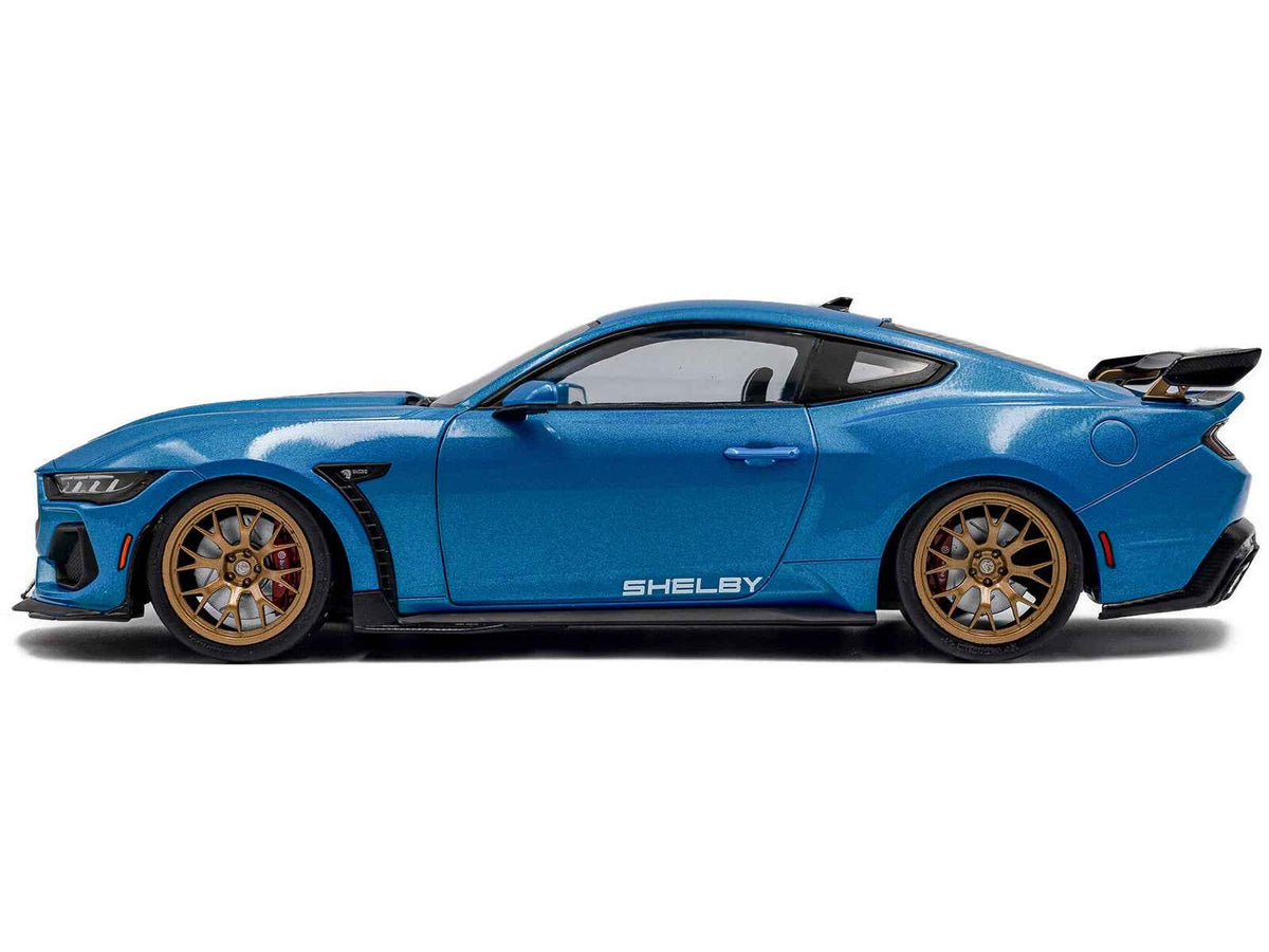 2024 Ford Shelby Mustang Super Snake diecast model car in Grabber Blue Metallic with black stripes by Solido, 1/18 scale.