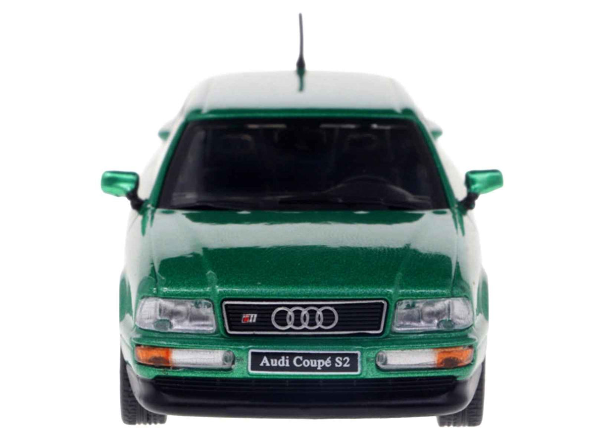 Miniature green Audi Coupe S2 diecast model car by Solido, detailed 1/43 scale collectible from the 1994 Audi lineup.
