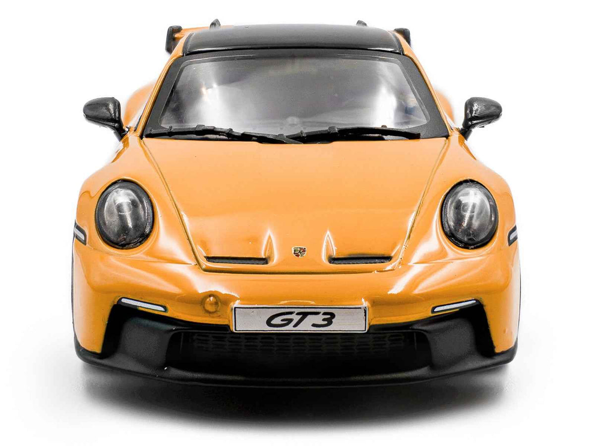 Miniature Porsche 911 (992) GT3 Signal Yellow diecast model car with black roof by Solido, scale 1/43, detailed collectible.