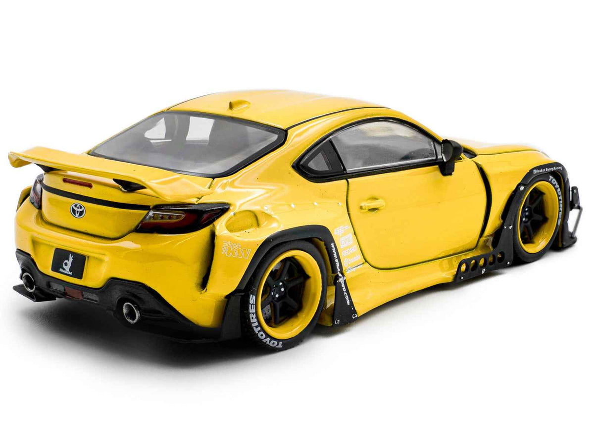 Yellow 2022 Toyota GR86 diecast model car by Solido, detailed miniature Toyota sports car in 1/43 scale.