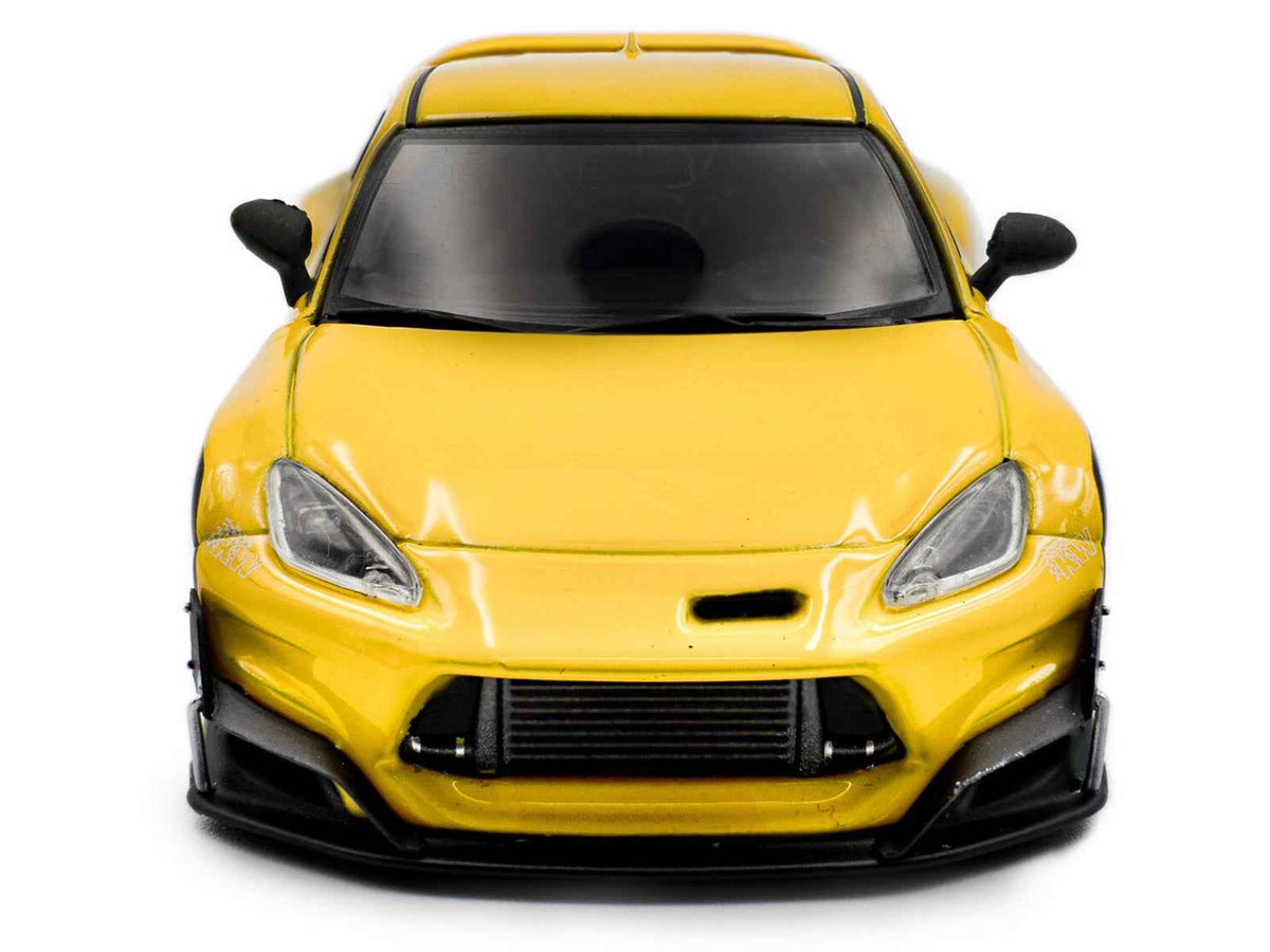 Yellow 2022 Toyota GR86 diecast model car by Solido, detailed 1/43 scale miniature from Miniature Motors.