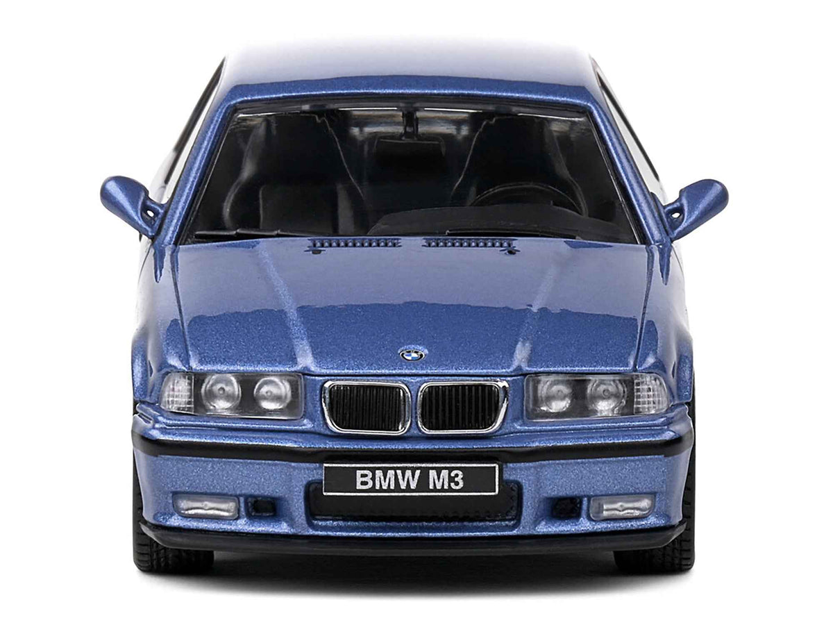 Miniature BMW E36 M3 Coupe diecast model car in Estoril Blue Metallic, 1/43 scale by Solido, detailed collectible vehicle.