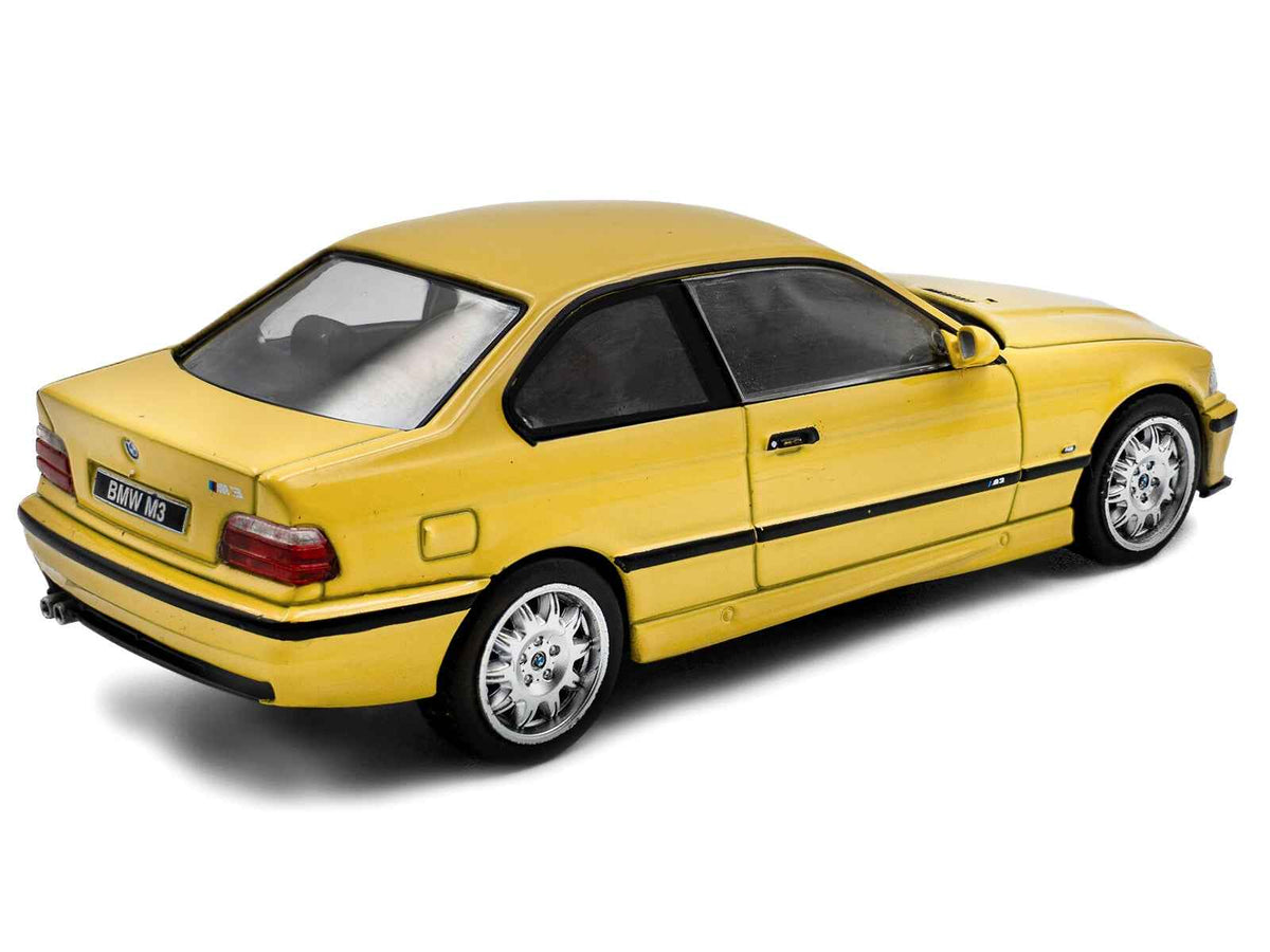 Dakar Yellow 1999 BMW E36 M3 Coupe diecast model car by Solido, detailed miniature BMW vehicle, part of BMW models collection.