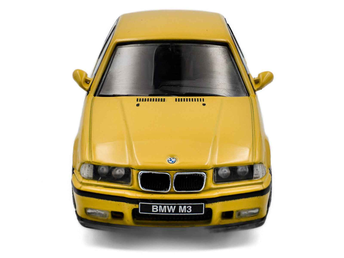 Dakar Yellow 1999 BMW E36 M3 Coupe diecast model car by Solido, detailed miniature BMW model in 1/43 scale.