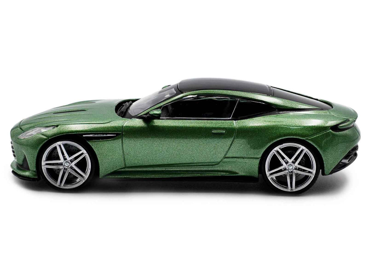 2023 Aston Martin DB12 Coupe diecast model by Solido, iridescent emerald metallic finish with black top, miniature car collectible.