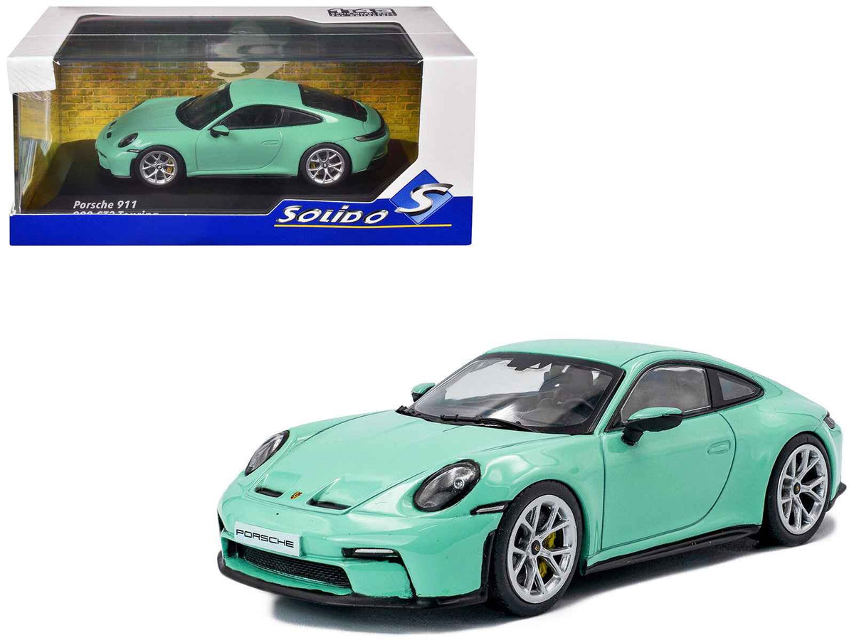 Mint green 2023 Porsche 911 (992) GT3 Touring diecast model car by Solido, detailed miniature Porsche collectible.