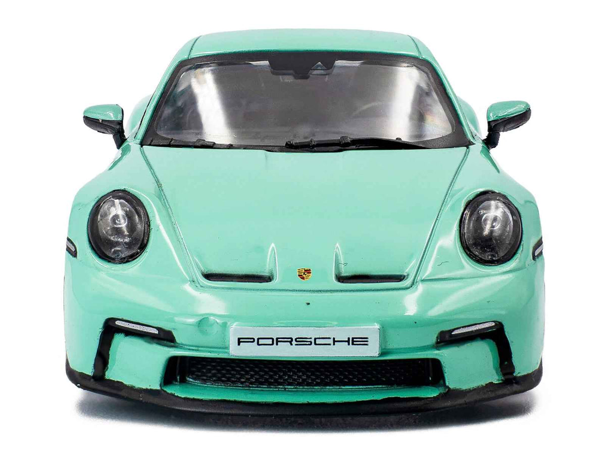 Mint green 2023 Porsche 911 (992) GT3 Touring diecast model car by Solido, detailed miniature Porsche model in 1/43 scale.