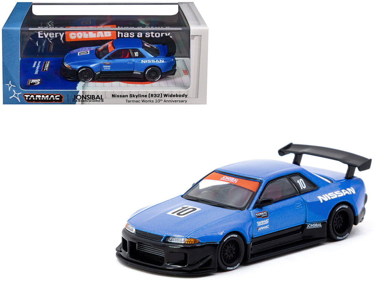 Blue metallic Nissan Skyline R32 widebody diecast model car by Tarmac Works, 1/64 scale, right-hand drive, 10th anniversary edition.