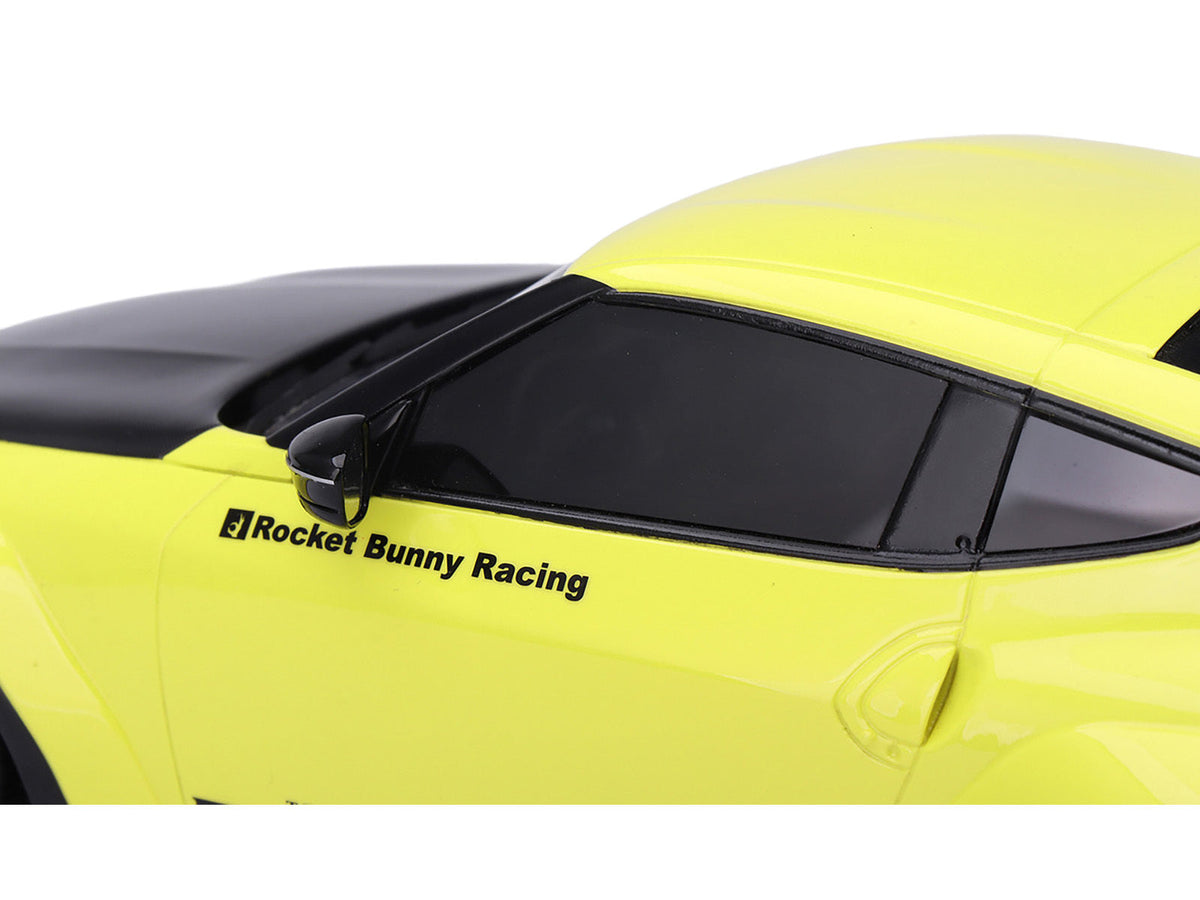 Miniature Motors Nissan Z (RZ34) Pandem Ikazuchi Yellow model car with matte black hood, 1/18 scale, detailed Nissan model.