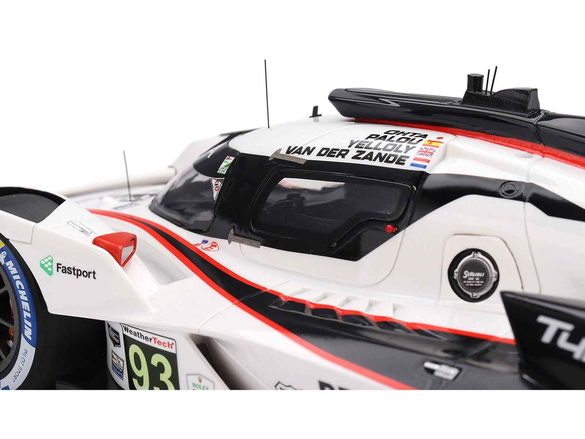 Miniature Acura ARX-06 GTP #93 model car featuring Kakunoshin Ohta, Alex Palou, Renger van der Zande, and Nick Yelloly from Top Speed.