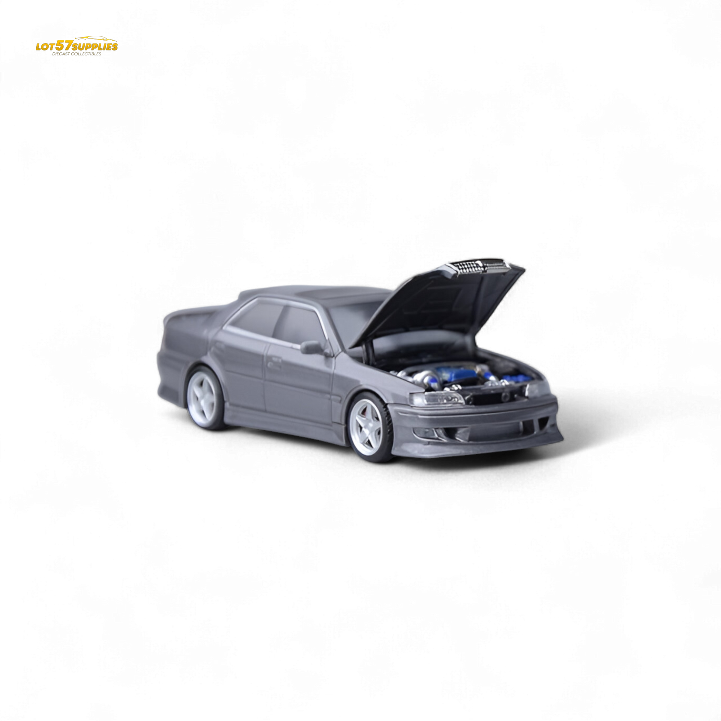Gunmetal gray Toyota JZX100 diecast model car in 1:64 scale by Lot57Supplies Diecast Shop, detailed view of the miniature vehicle.