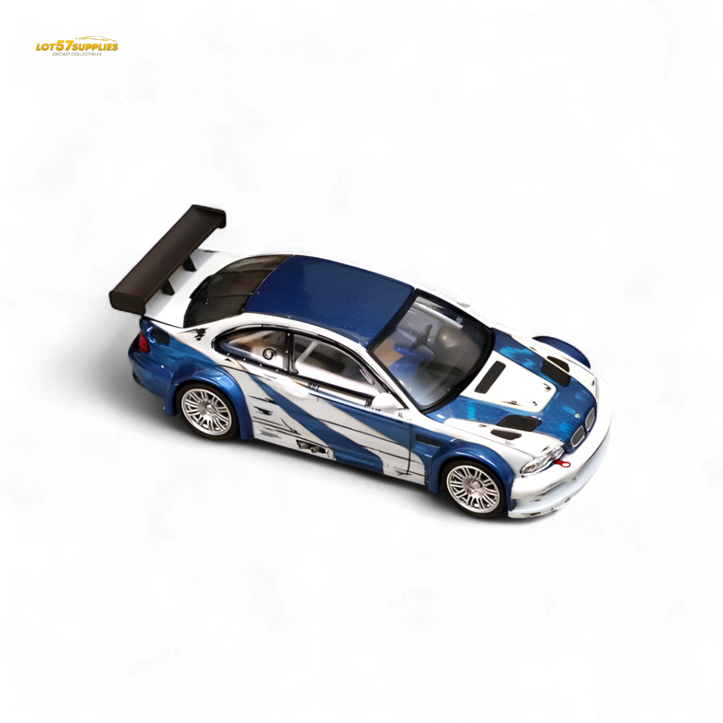 White and blue BMW E46 M3 GTR diecast car with NFS livery, detailed model in 1:64 scale from Lot57Supplies Diecast Shop.