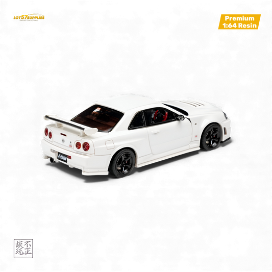 Pearl white Nissan Skyline GT-R R34 Z-TUNE diecast car model in 1:64 scale, featuring detailed design and realistic features.