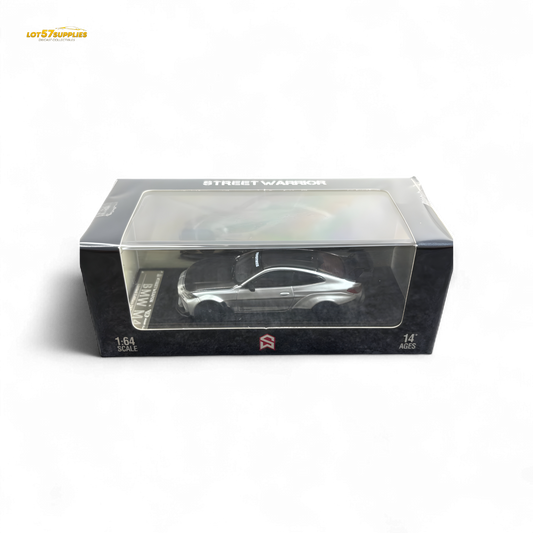 Silver BMW G82 M4 diecast model with wide-body modifications, detailed 1:64 scale, from Lot57Supplies Diecast Shop.