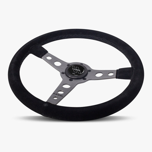 Black Alcantara suede steering wheel with graphite spoke and black stitching, designed for performance vehicles by Speedzone Performance LLC.
