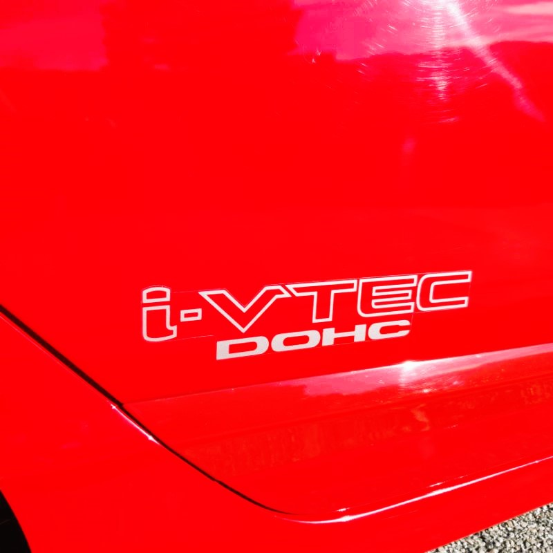 Pair of OEM-sized i-VTEC DOHC door and quarter panel decals by Evergreen Kings, with black and red design details.