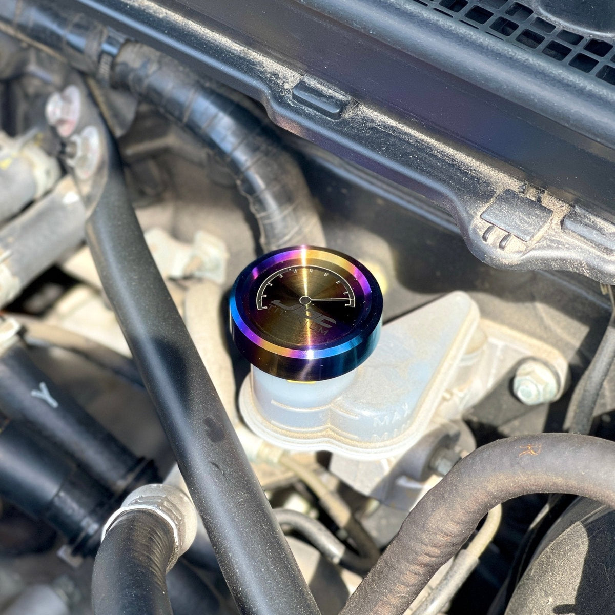 JDC Titanium clutch fluid reservoir cap cover for BRZ, FR-S, 86, and Subaru models, featuring a sleek, durable titanium finish.