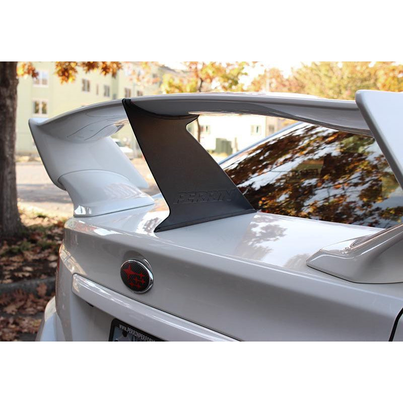 Black Perrin wing stabilizer for Subaru WRX/STI 2015-2021, shown installed on the vehicle's rear spoiler.