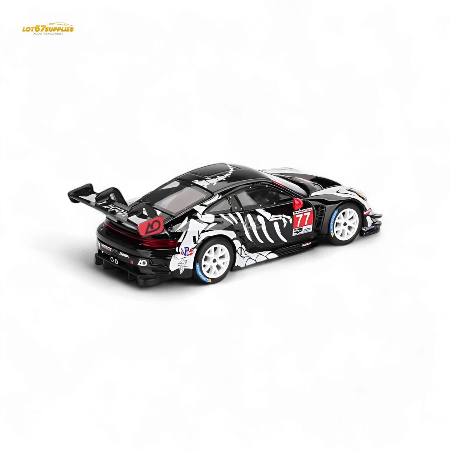 MiniGT Porsche 911 GT3 R Skeleton diecast car in 1:64 scale, detailed model with skeleton design, black and orange accents.