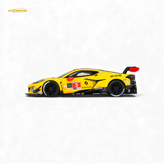 Mini-GT Chevrolet Corvette Z06 GT3.R diecast model in 1:64 scale, detailed black and yellow racing car, front view.