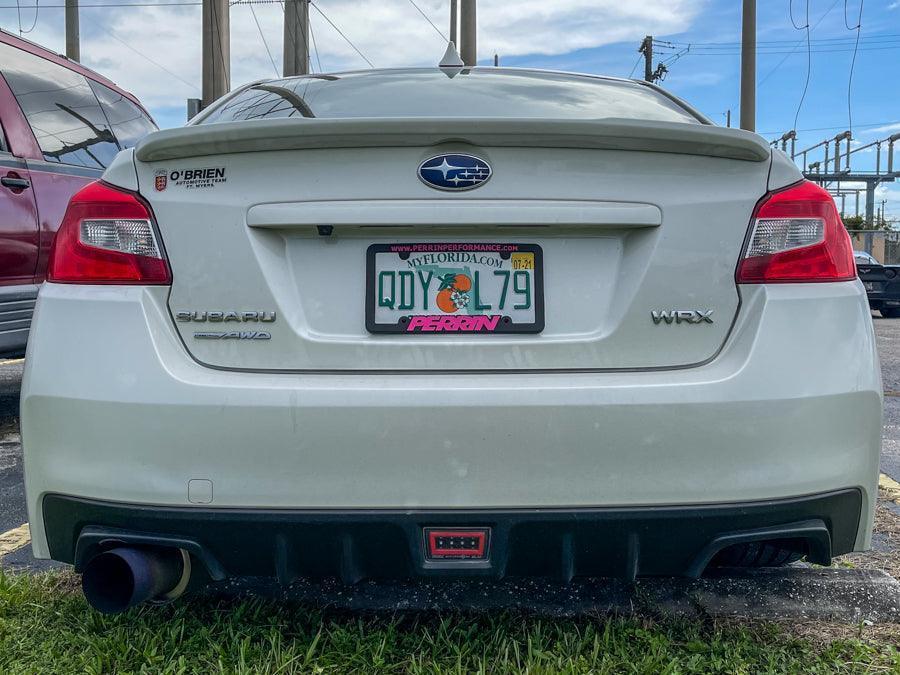 Red facelift 1.5 tail light overlays for 2015-2021 Subaru WRX STI taillights, designed by StickerFab.