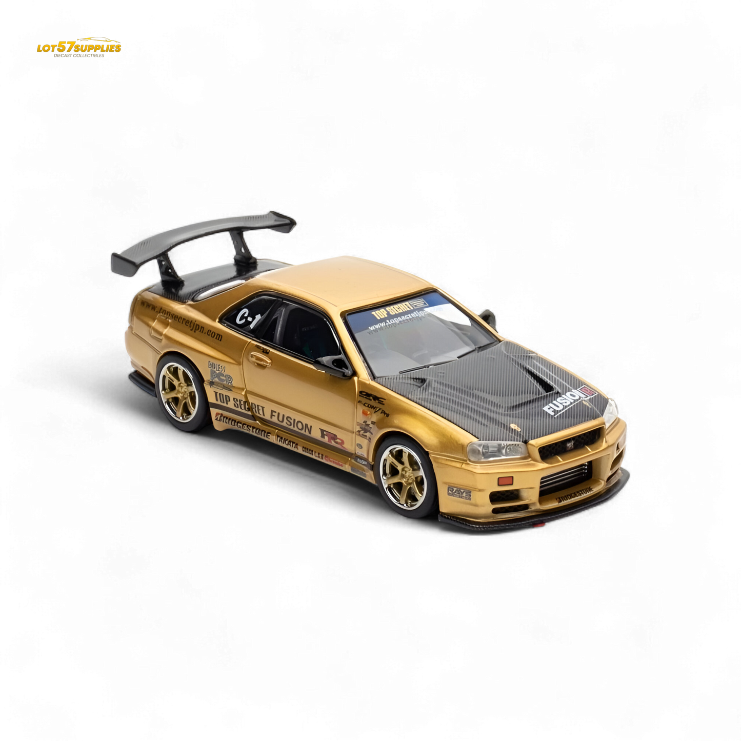 Gold Inno64 Top Secret R34 Nissan GT-R diecast model, 1:64 scale, detailed miniature car with sleek design.