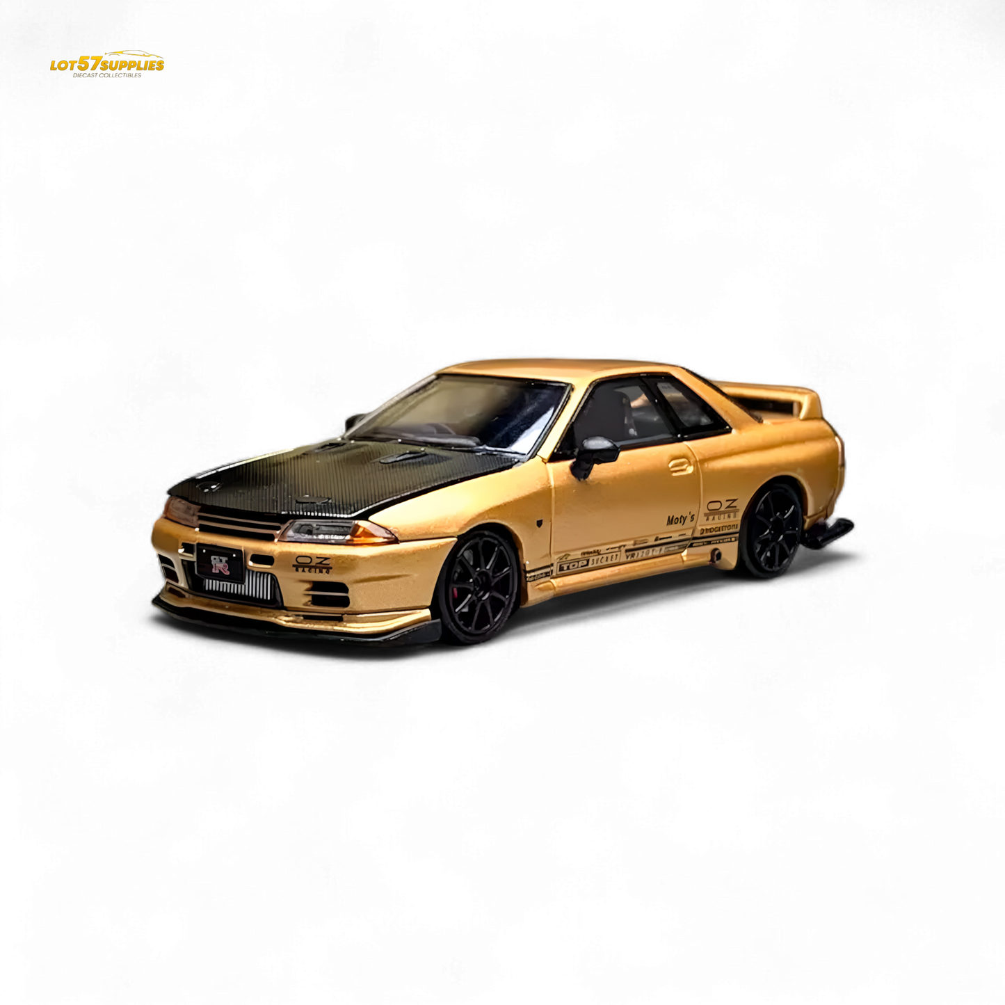 Gold Focal Horizon Nissan Skyline GT-R R32 Top Secret diecast model, 1:64 scale, detailed miniature car with realistic features.