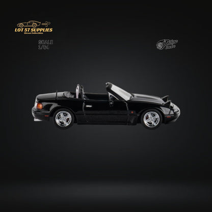 Miniature metallic black Mazda Eunos Roadster MX-5 diecast model by Lot57Supplies, 1:64 scale, detailed and realistic.