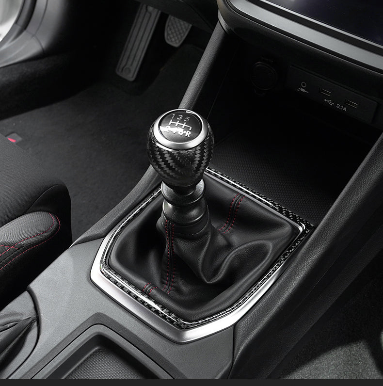 JDMuscle Tanso Dry Carbon Fiber Shift Knob Surround Cover for 2022-2025 Subaru WRX, close-up of sleek carbon fiber trim kit piece