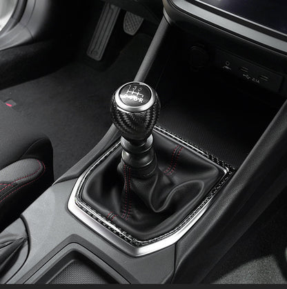 JDMuscle Tanso Dry Carbon Fiber Shift Knob Surround Cover for 2022-2025 Subaru WRX, close-up of sleek carbon fiber trim kit piece