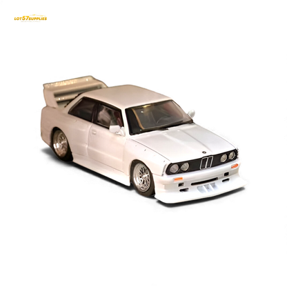White BMW E30 M3 diecast model by Lot57Supplies, detailed 1:64 scale car with sporty design and realistic features.