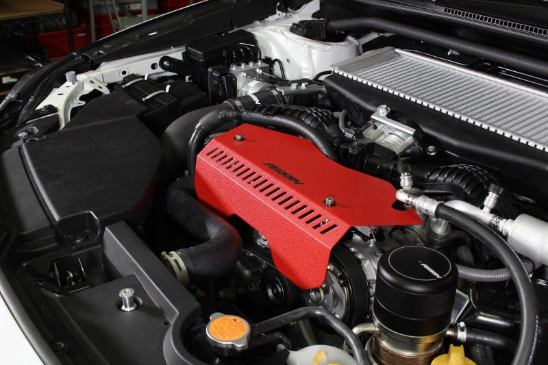 Red Perrin pulley cover for 2022-2025 Subaru WRX, JDMuscle belt cover with sleek finish, designed for engine bay enhancement.