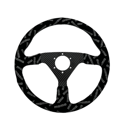 Black suede racing steering wheel with carbon center from Momo Track Style, designed for high-performance driving.