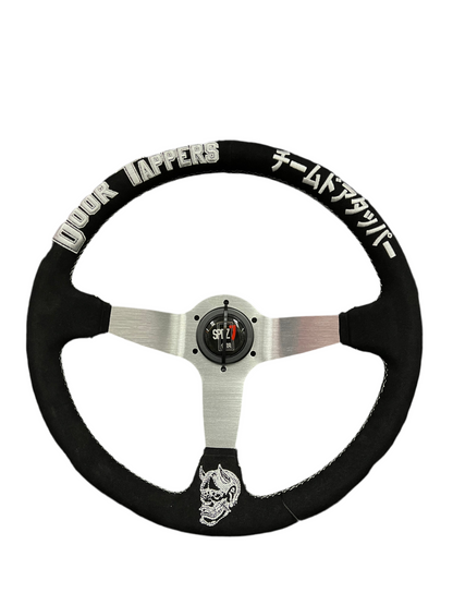 SPD Z1 X DoorTapper steering wheel by Speedzone Performance LLC with black grip and metal spokes for racing or performance vehicles