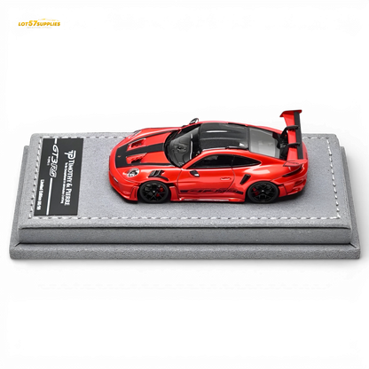 Red 1:64 scale TP Porsche 911 992 GT3 RS diecast model by Lot57Supplies Diecast Shop, detailed miniature car.