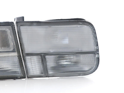 Set of four clear rear tail lights for 1996-2000 Honda Civic 2-door coupe by DEPO, designed for JDM style and optimal visibility.