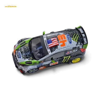 Miniature Ford Fiesta diecast model in Gymkhana livery, 1:64 scale, featuring detailed decals and vibrant racing design.