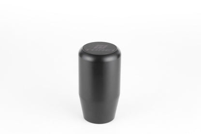 FR SPORT Tomei Duracon manual transmission shift knob with a sleek design, shown on a car gear shift in close-up view.