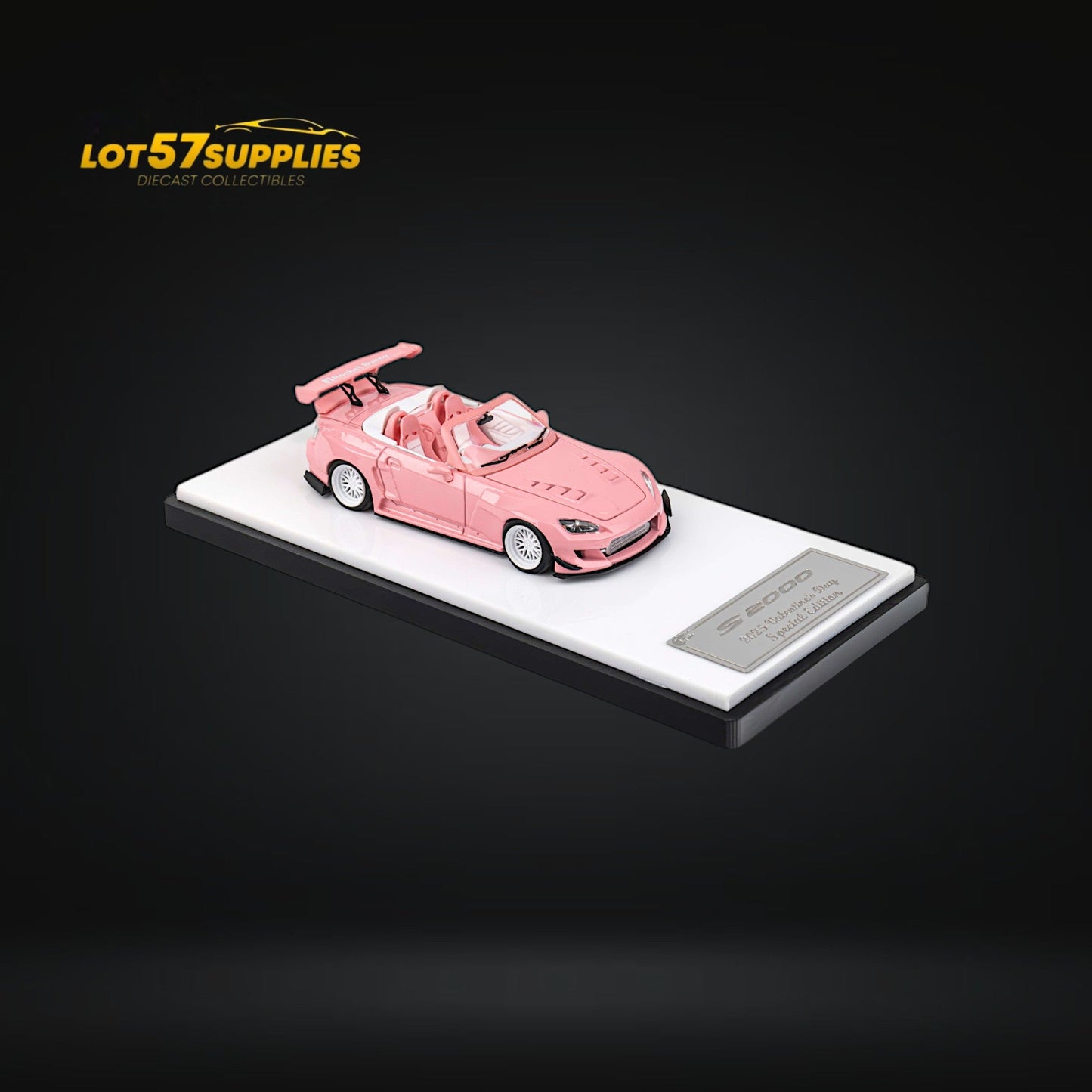 Pink Honda S2000 Microturbo diecast model by Rocket Bunny, 1:64 scale, featuring detailed design and vibrant color.