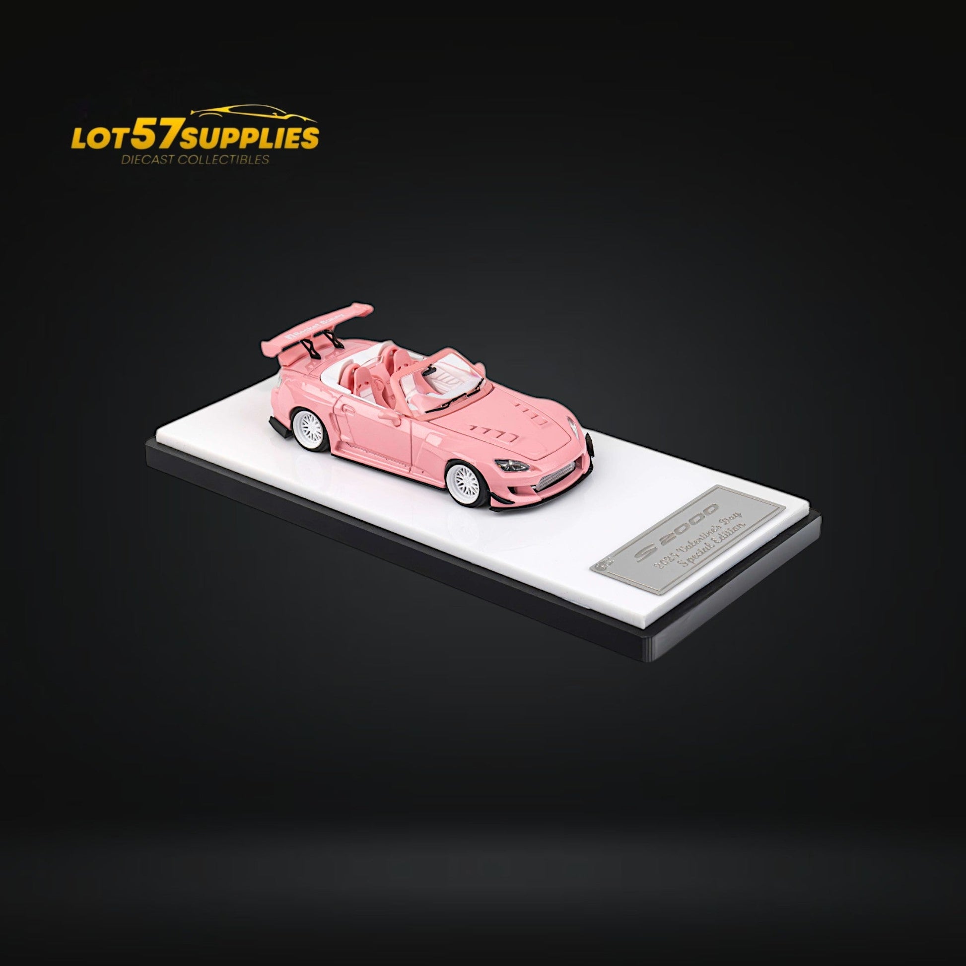 Pink Honda S2000 Microturbo diecast model by Rocket Bunny, 1:64 scale, featuring detailed design and vibrant color.