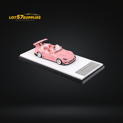 Pink Honda S2000 Microturbo diecast model by Rocket Bunny, 1:64 scale, featuring detailed design and vibrant color.