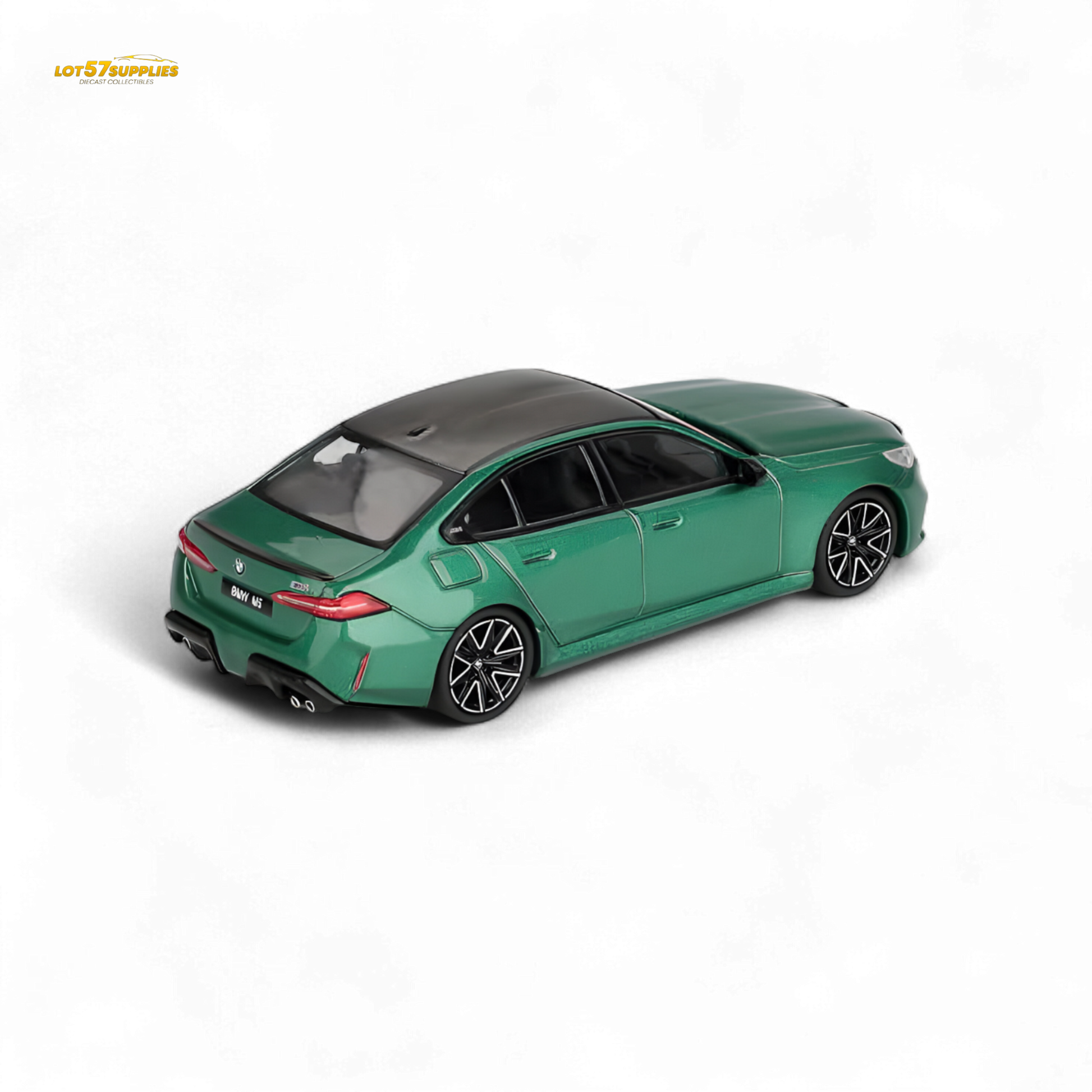 Mini GT BMW M5 diecast model in Isle of Man Green Metallic, 1:64 scale, detailed BMW car with realistic features.