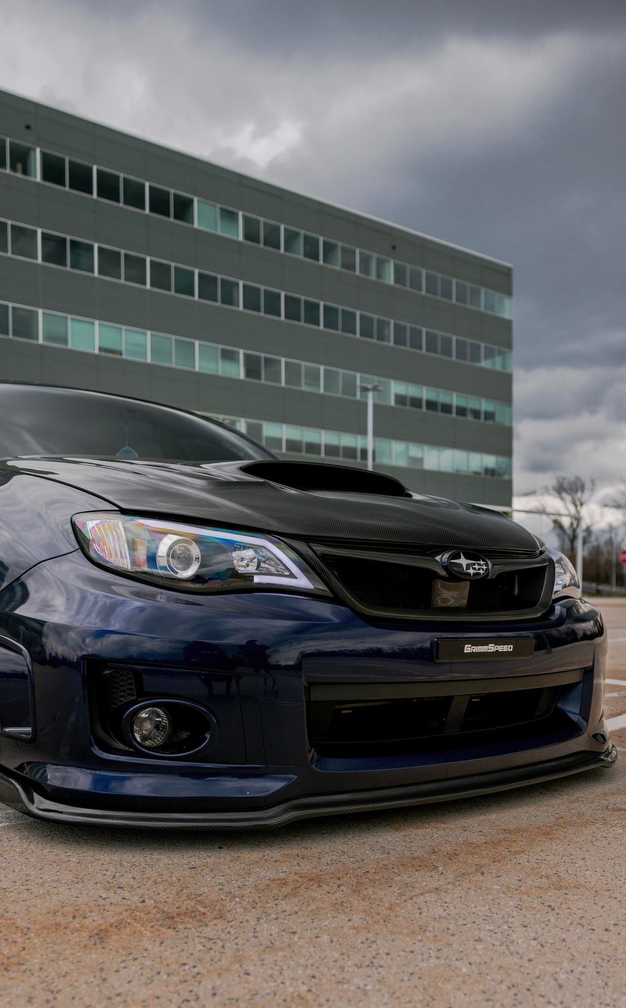 JDMuscle front carbon fiber lip for 2011-2014 Subaru WRX and STI, sleek aerodynamic car front lip with carbon fiber finish