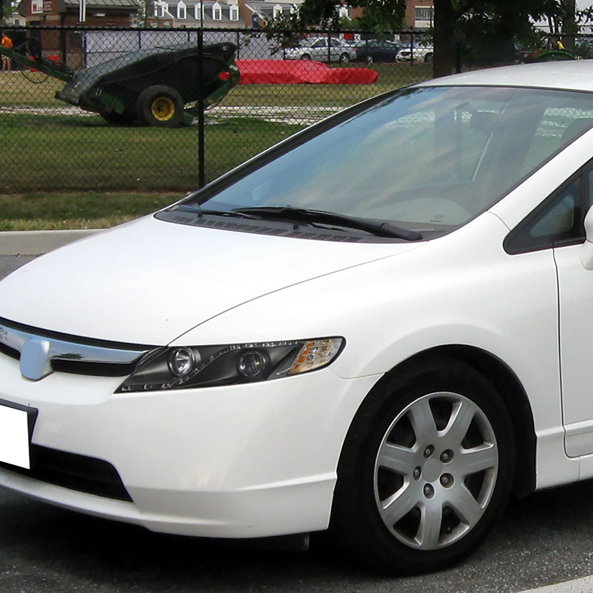 Black Spec-D R8-style LED strip headlights for 2006-2011 Honda Civic Sedan, featuring sleek design and bright LED illumination.