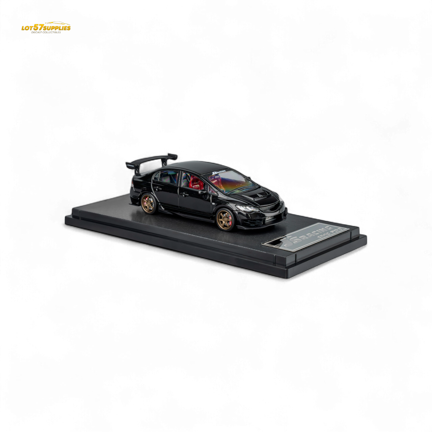 Metallic black Honda Microturbo FD2 J'S Racing diecast model car in 1:64 scale, detailed view showing realistic features.