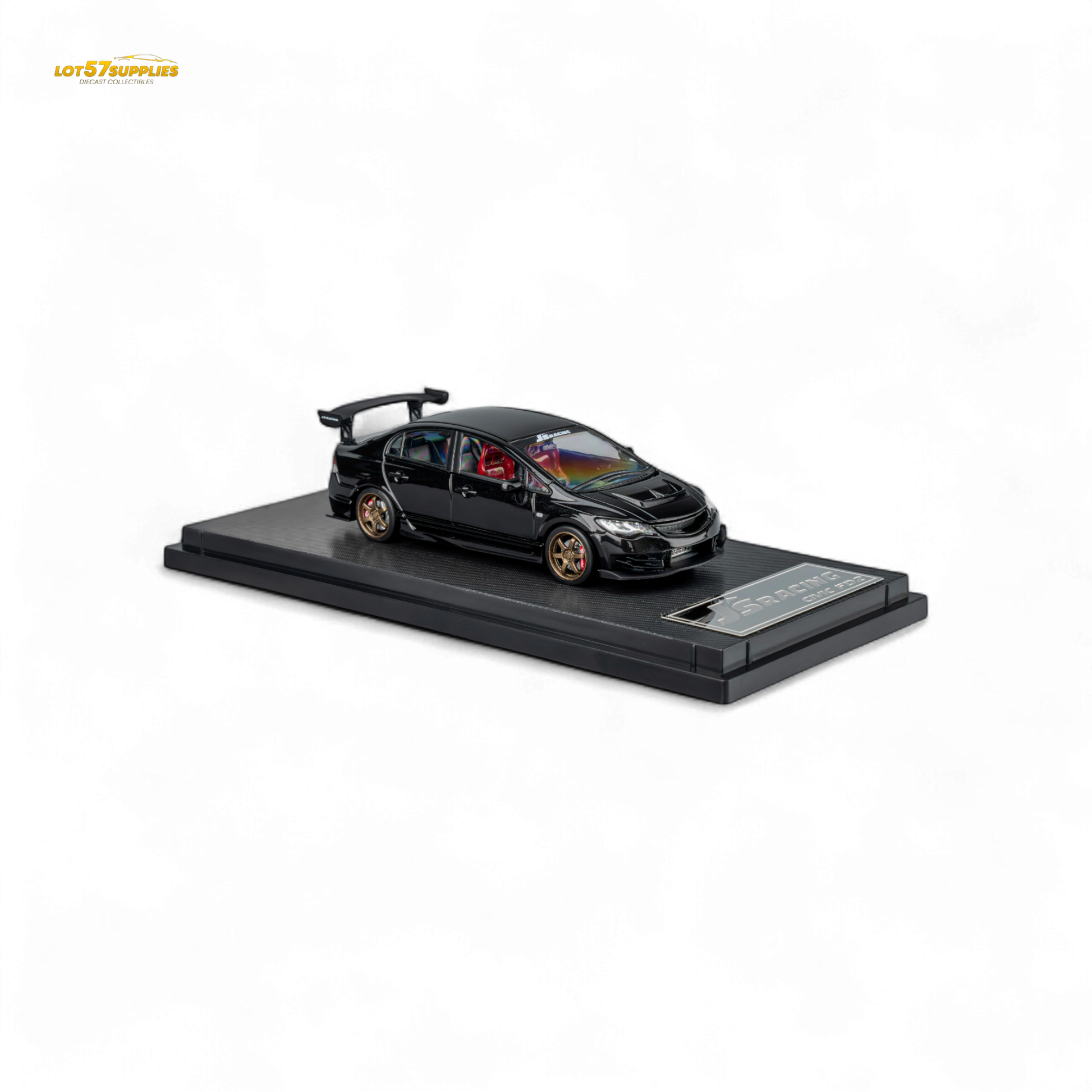 Metallic black Honda Microturbo FD2 J'S Racing diecast model car in 1:64 scale, detailed view showing realistic features.