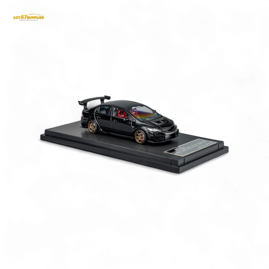 Metallic black Honda Microturbo FD2 J'S Racing diecast model car in 1:64 scale, detailed view showing realistic features.